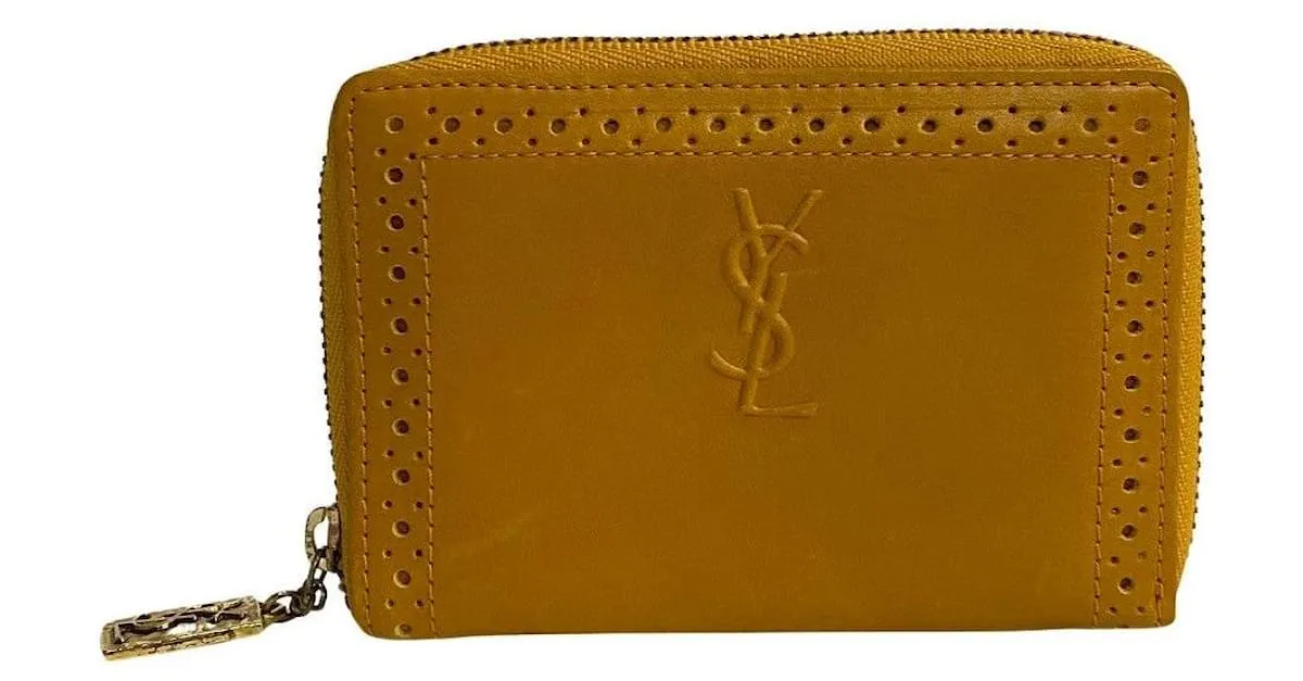 Billetera de cuero Yves Saint Laurent con cremallera, estuche para monedas de cuero en muy buen estado 