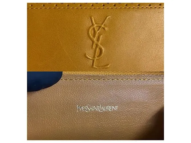 Billetera de cuero Yves Saint Laurent con cremallera, estuche para monedas de cuero en muy buen estado 