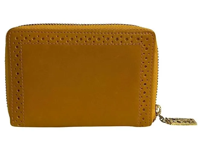 Billetera de cuero Yves Saint Laurent con cremallera, estuche para monedas de cuero en muy buen estado 