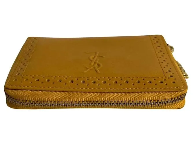 Billetera de cuero Yves Saint Laurent con cremallera, estuche para monedas de cuero en muy buen estado 