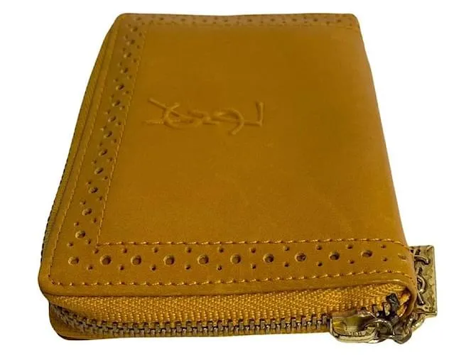 Billetera de cuero Yves Saint Laurent con cremallera, estuche para monedas de cuero en muy buen estado 