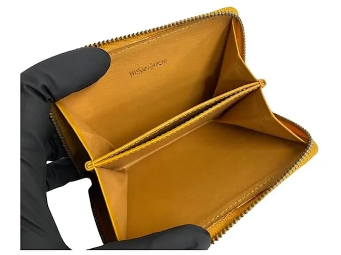 Billetera de cuero Yves Saint Laurent con cremallera, estuche para monedas de cuero en muy buen estado 