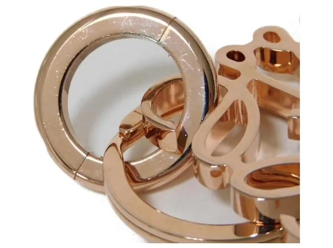 Llavero de latón dorado rosa Loewe 